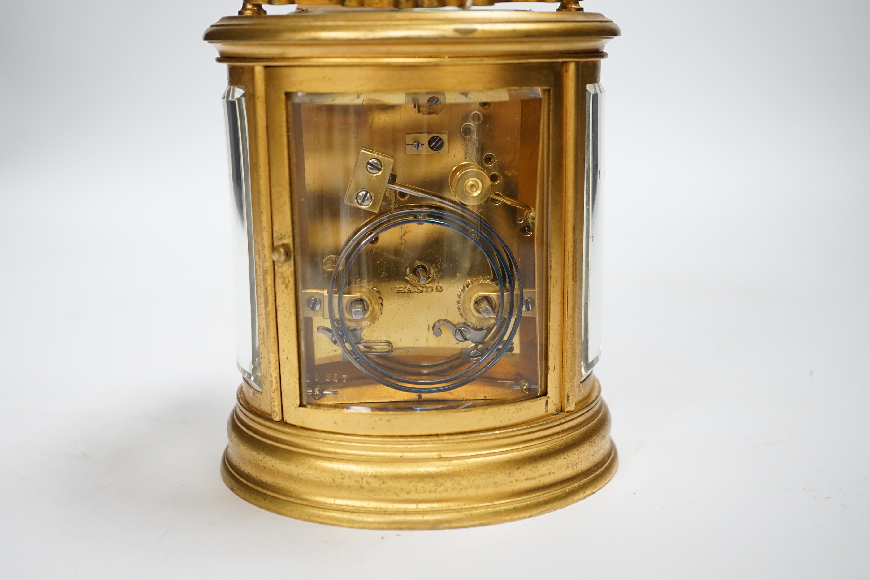 A Drocourt hour-repeating oval carriage clock, striking on a coiled gong, 13cm